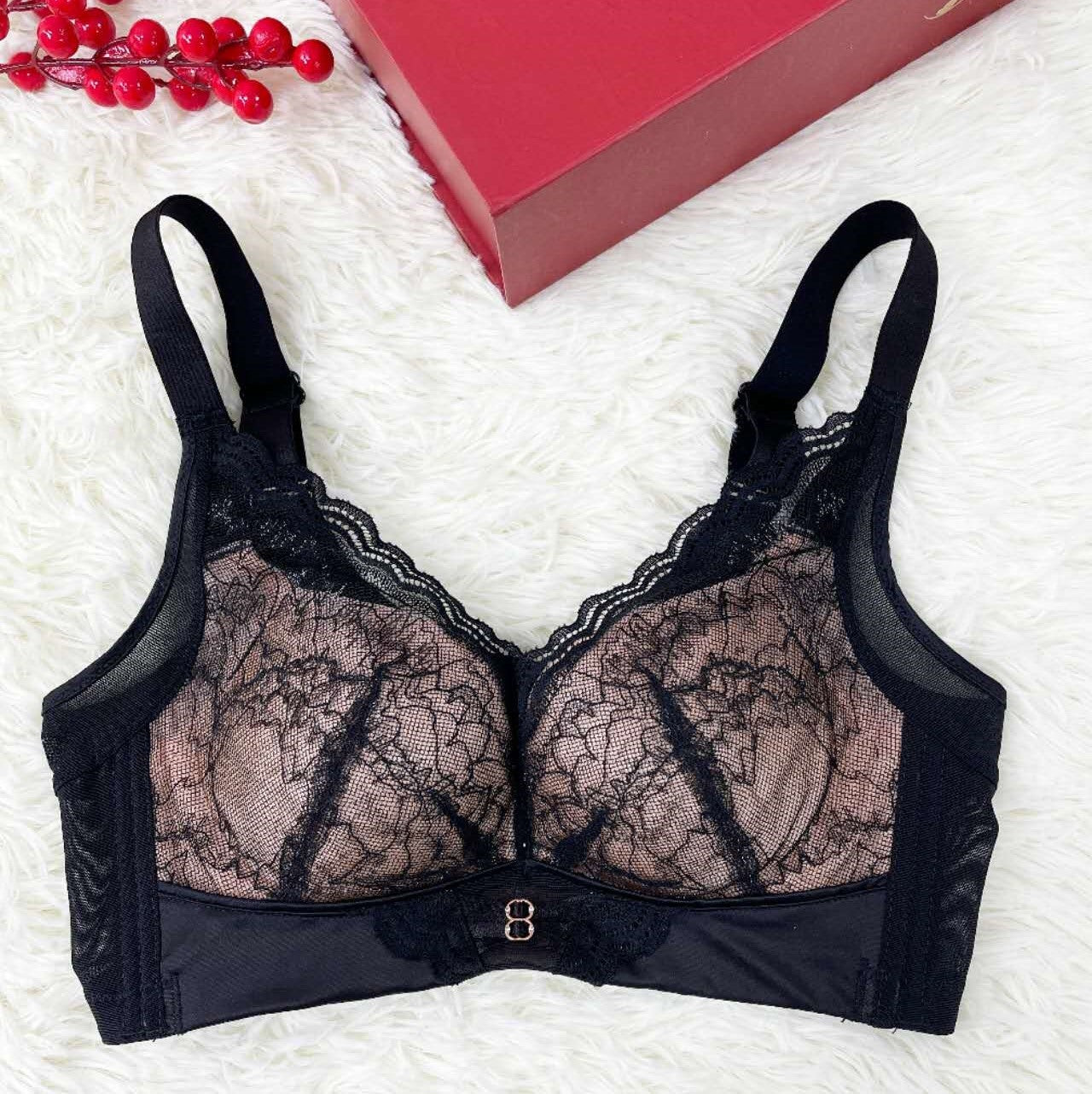 Angled view of wireless lace contour bra with high-elastic sidebands for smoothing