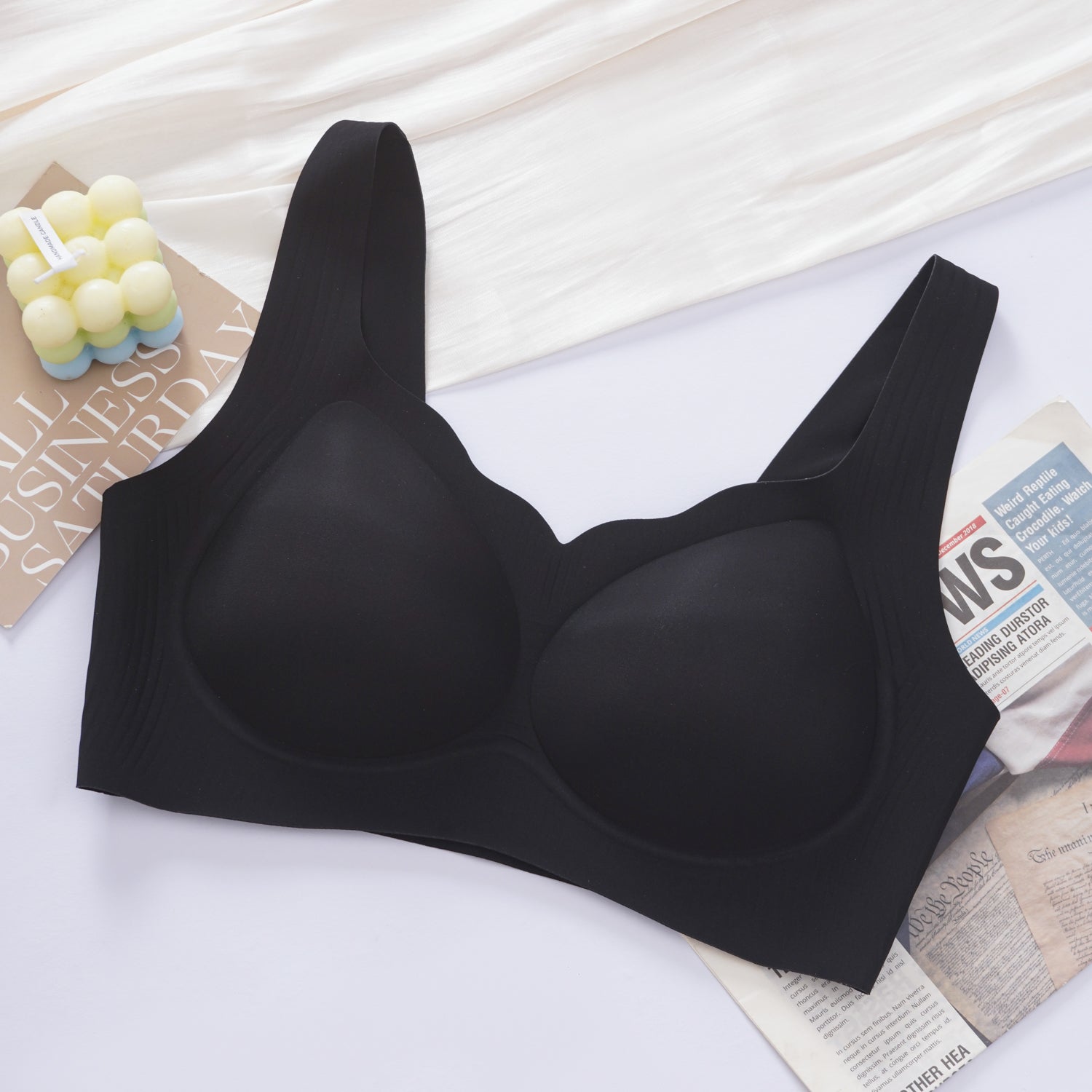 Side view of black wireless seamless contour bra showing arched lifting underband