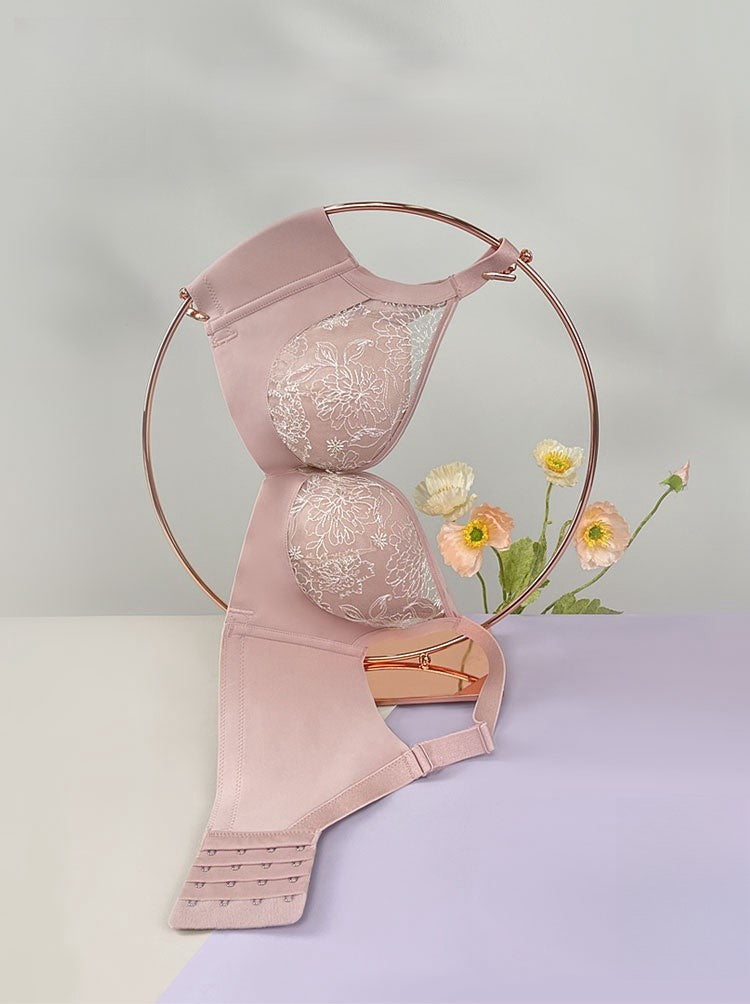 Detail view of floral lace embroidery and soft cotton lining on underwire contour bra