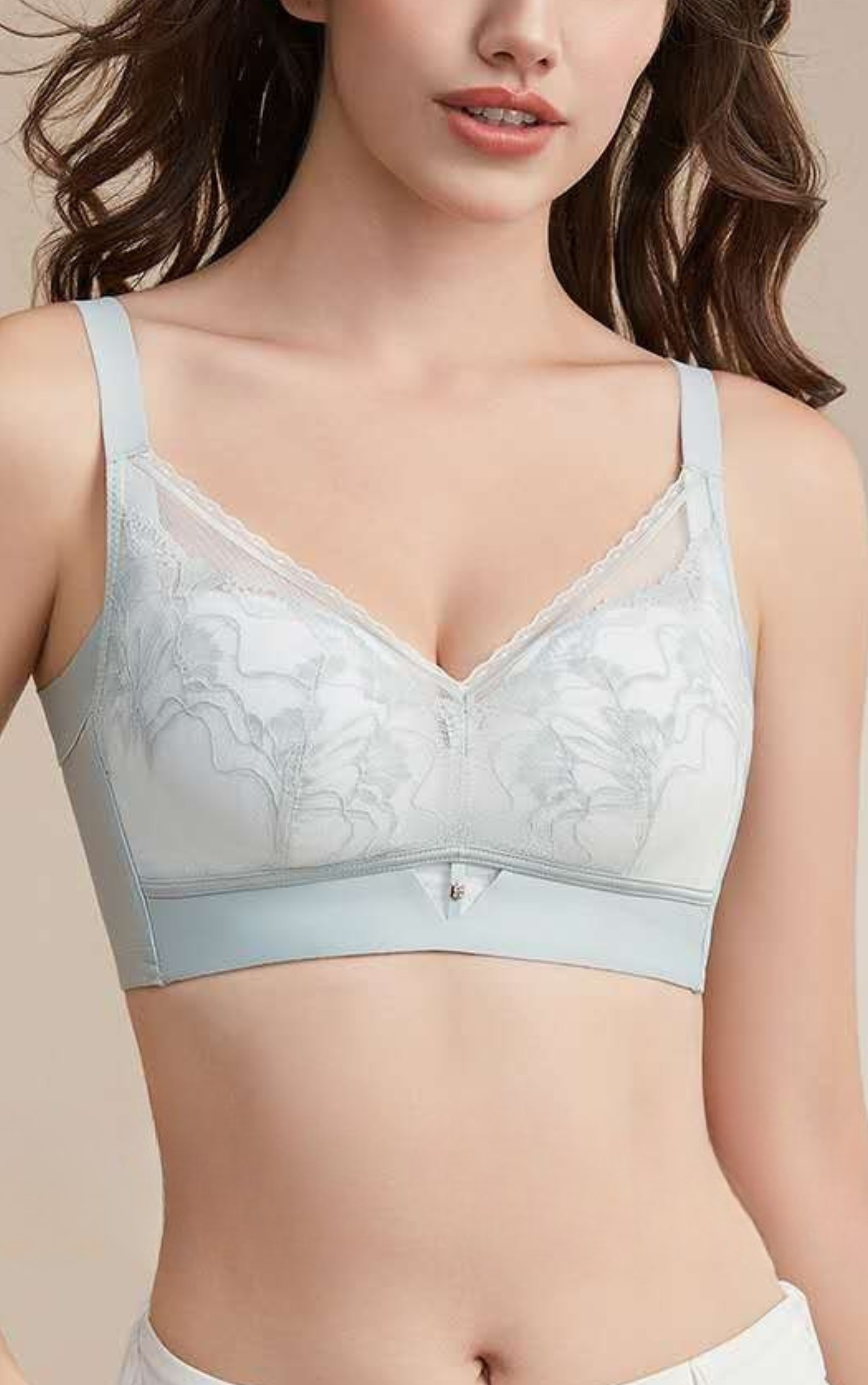 Back view of black silk-lined wireless contour bra highlighting U-shaped back sculpting design