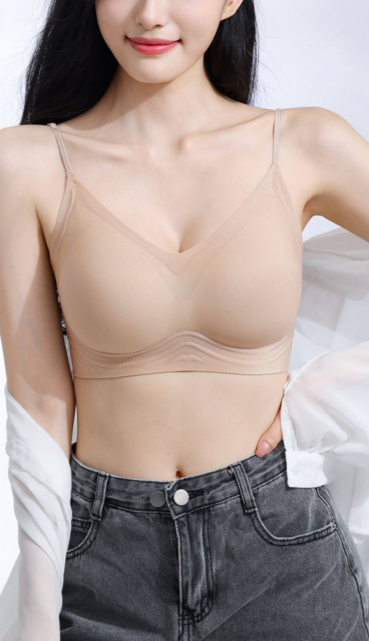 Side view of beige wireless seamless contour bra showing convertible straps and smooth profile
