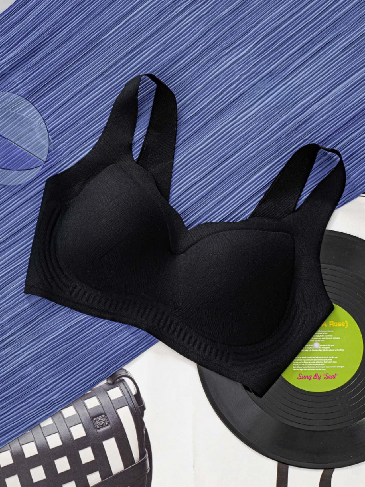 Angled view of wireless cloud lift contour bra with built-in massage beads