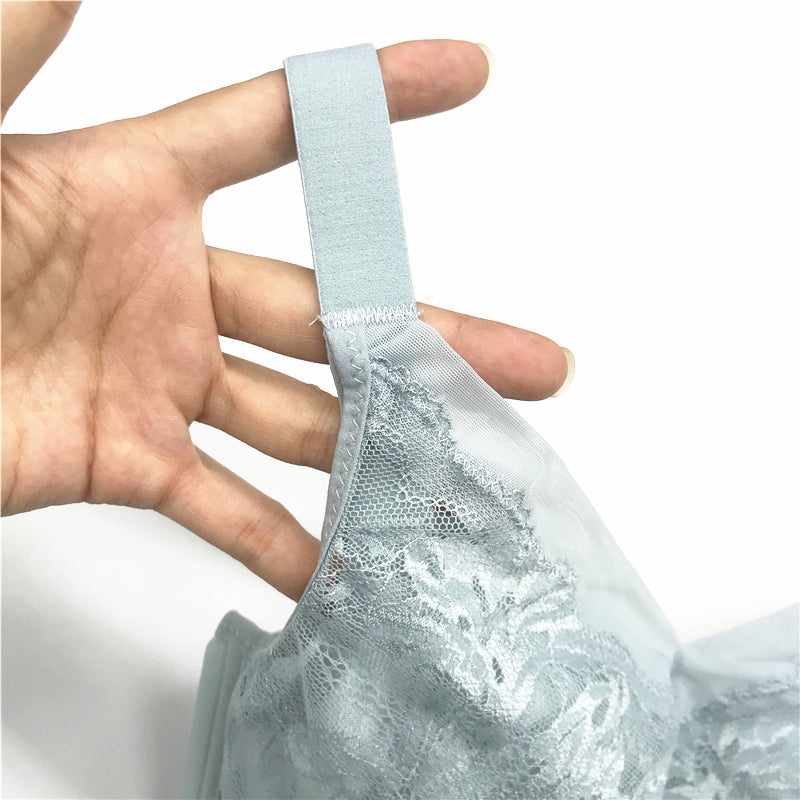 Close-up of adjustable anti-slip strap on blue wireless minimizer contour bra