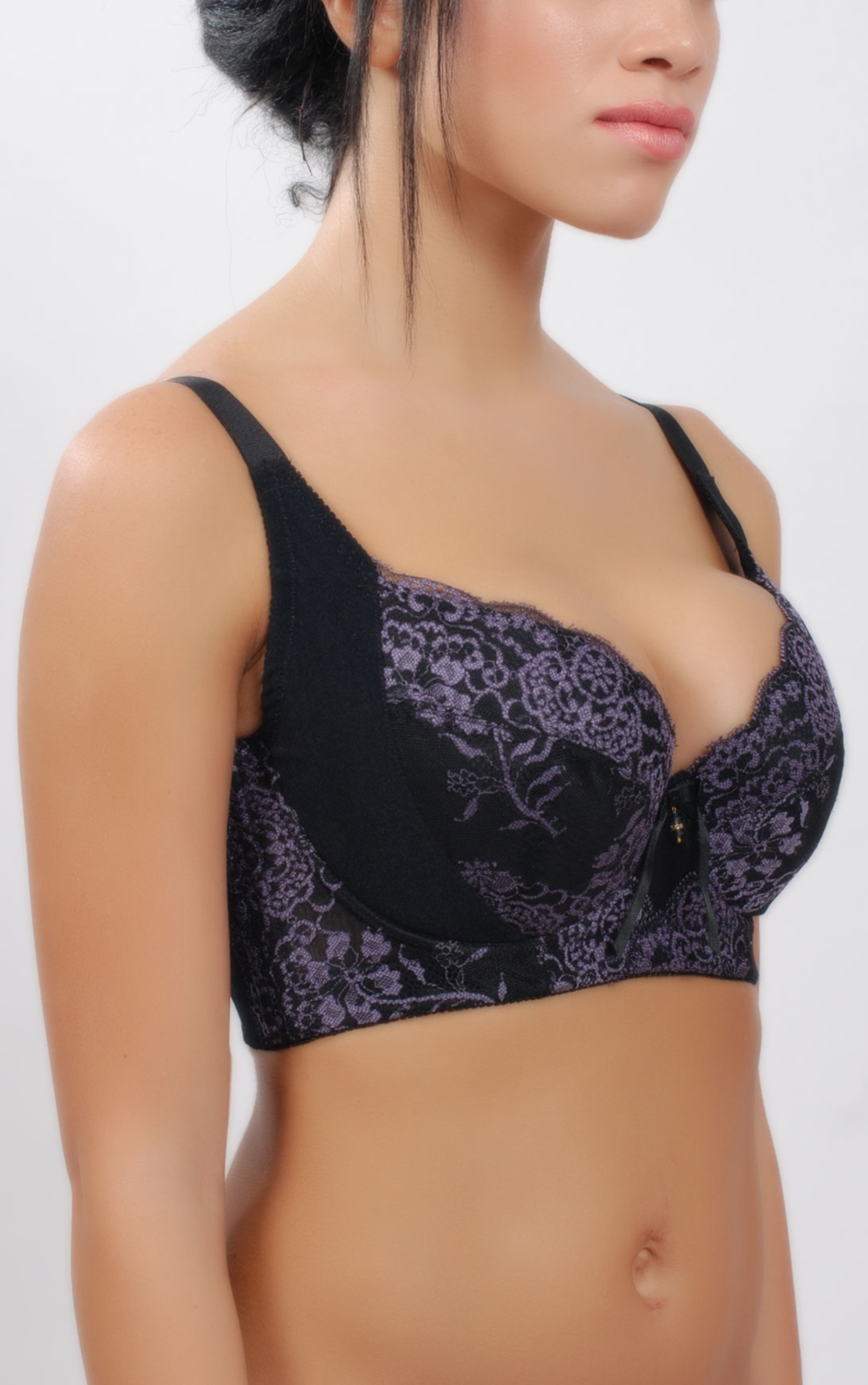 Side view of beige wireless padded contour bra showing wide straps and back-smoothing design