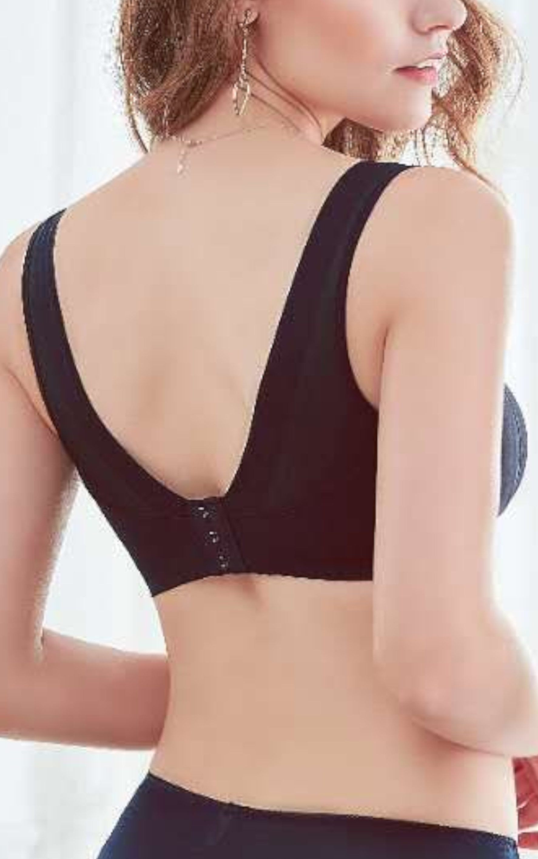 Side view of beige wireless minimizer contour bra showing wide back-smoothing sidebands