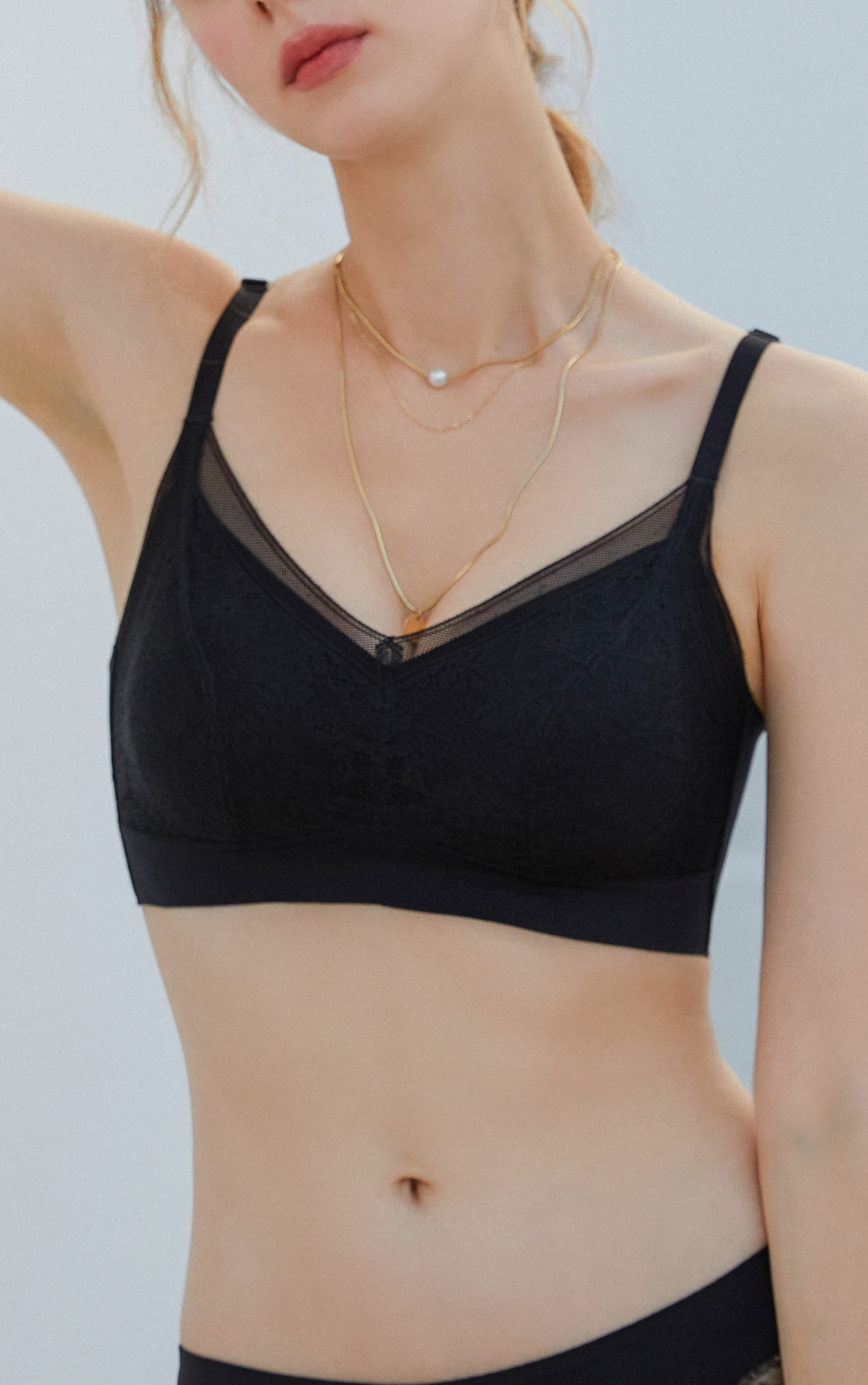 Front view of black floral lace wireless cotton contour bra with full coverage cups and wide straps