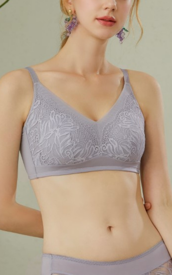 Front view of beige lace side-smoothing wireless minimizer contour bra with extra-high sidebands