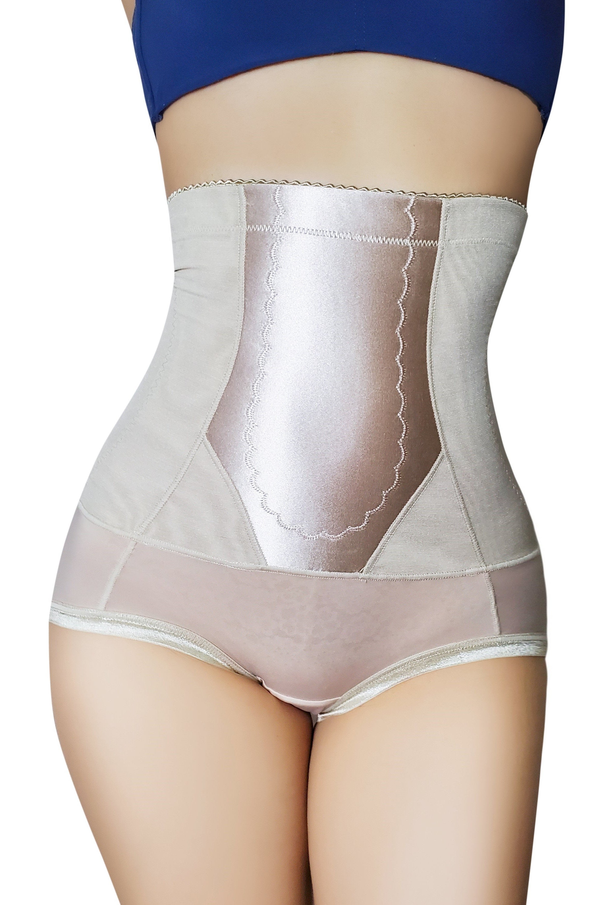 Side view of black charcoal fiber shapewear brief showing high-waist design