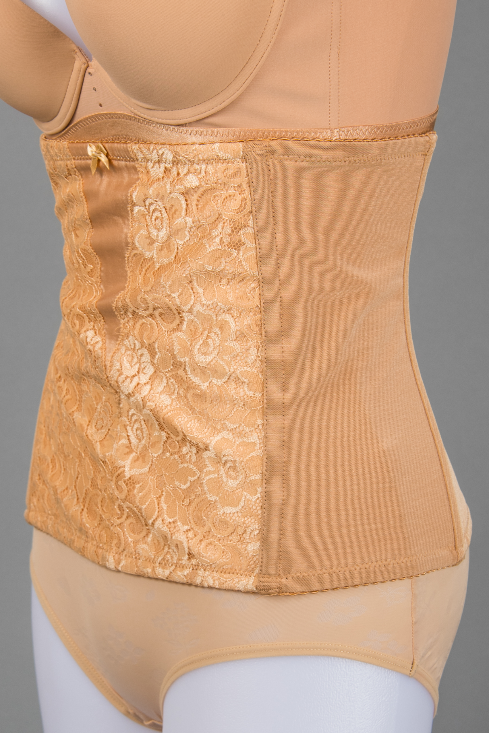 Front view of beige waist slimming corset shapewear with firm tummy control panel