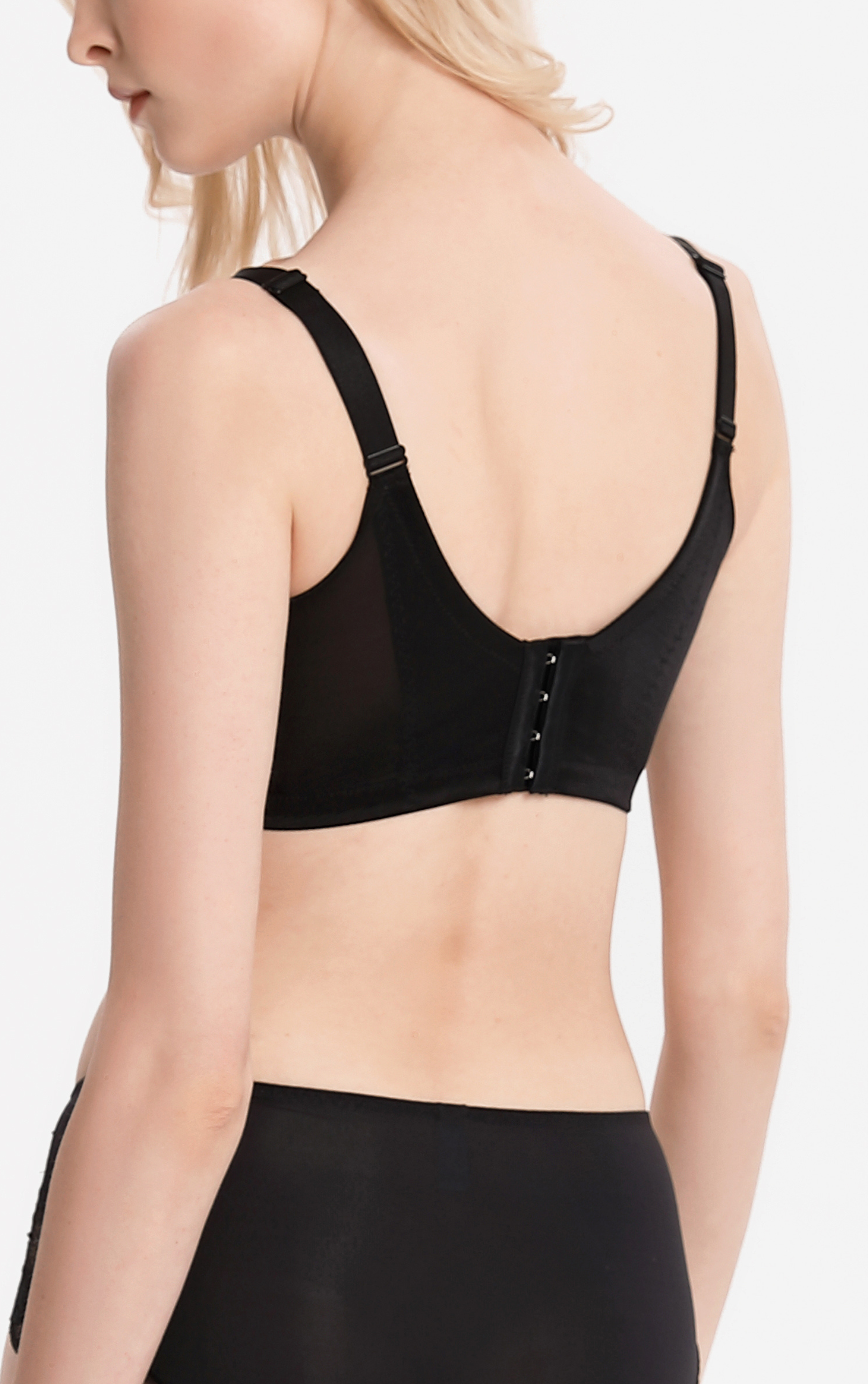 Side view of beige wireless contour bra showing wide mesh sidebands for back smoothing