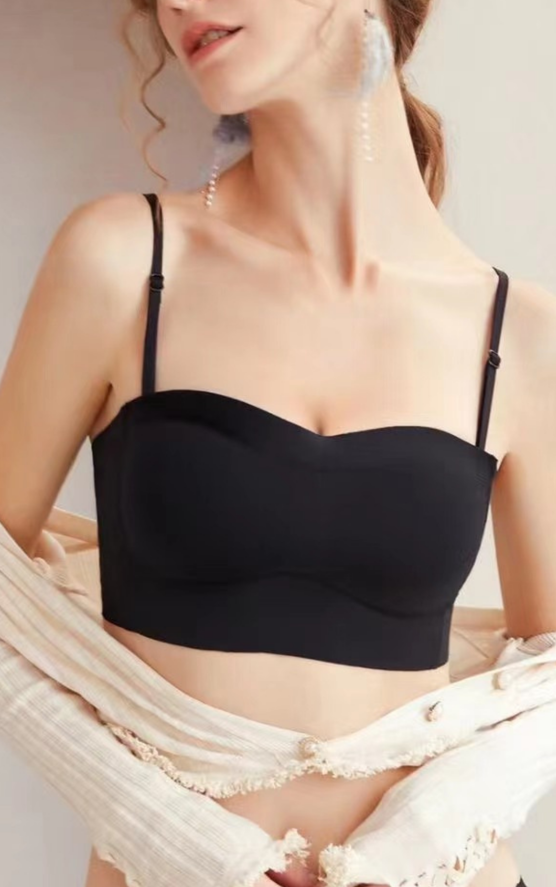 Angled view of white strapless multiway contour bra with versatile convertible straps