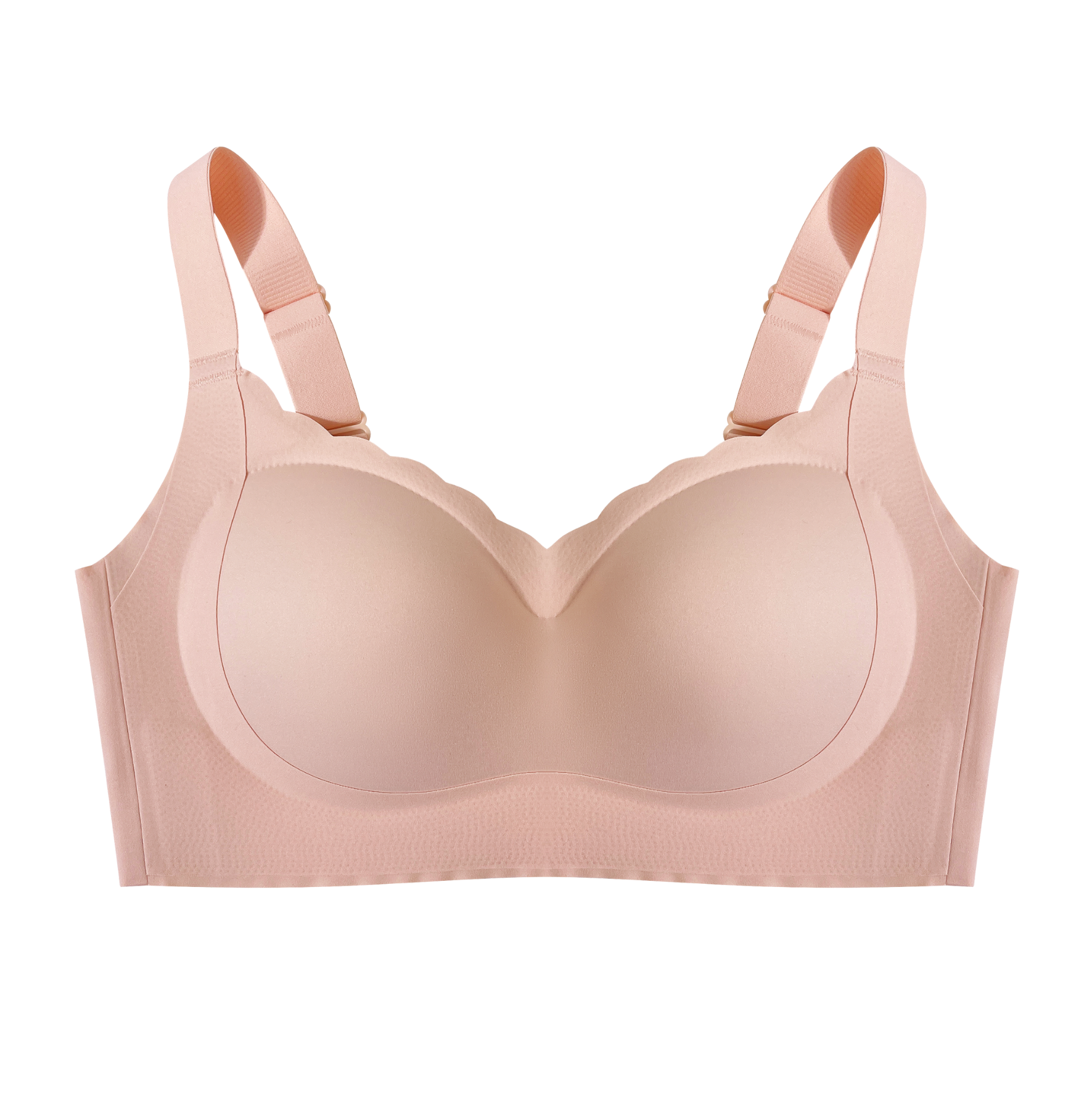  A beige wireless bra on a plain background, highlighting the soft fabric and wide straps.