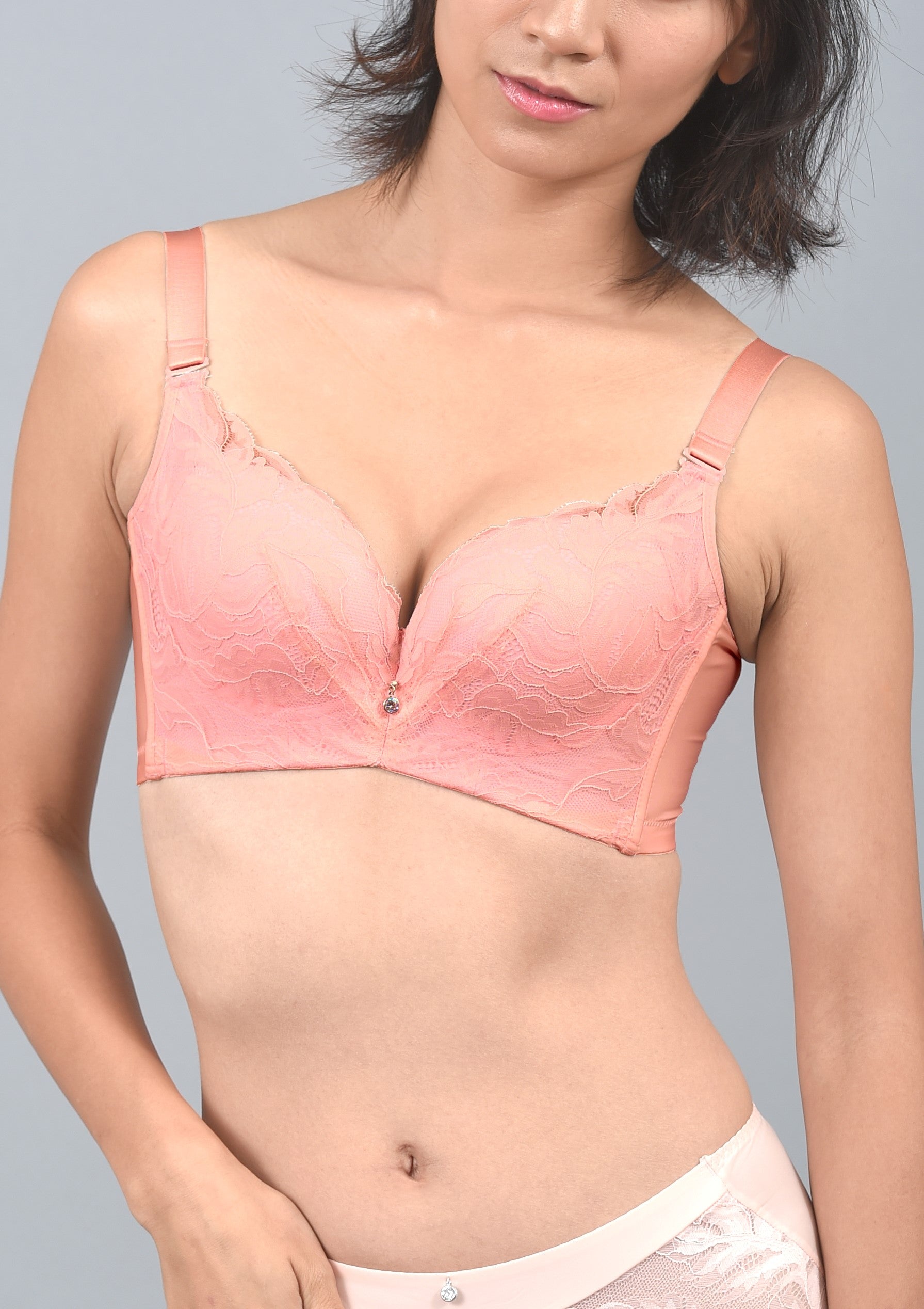 Detail view of lace demi contour bra 3D mold-cup and floral lace detailing