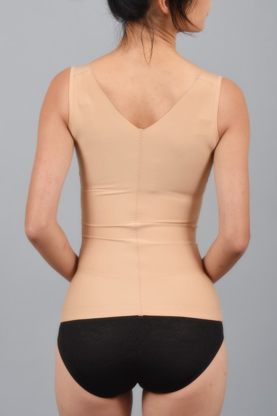 Back view of beige camisole shapewear tank top highlighting seamless back-smoothing design