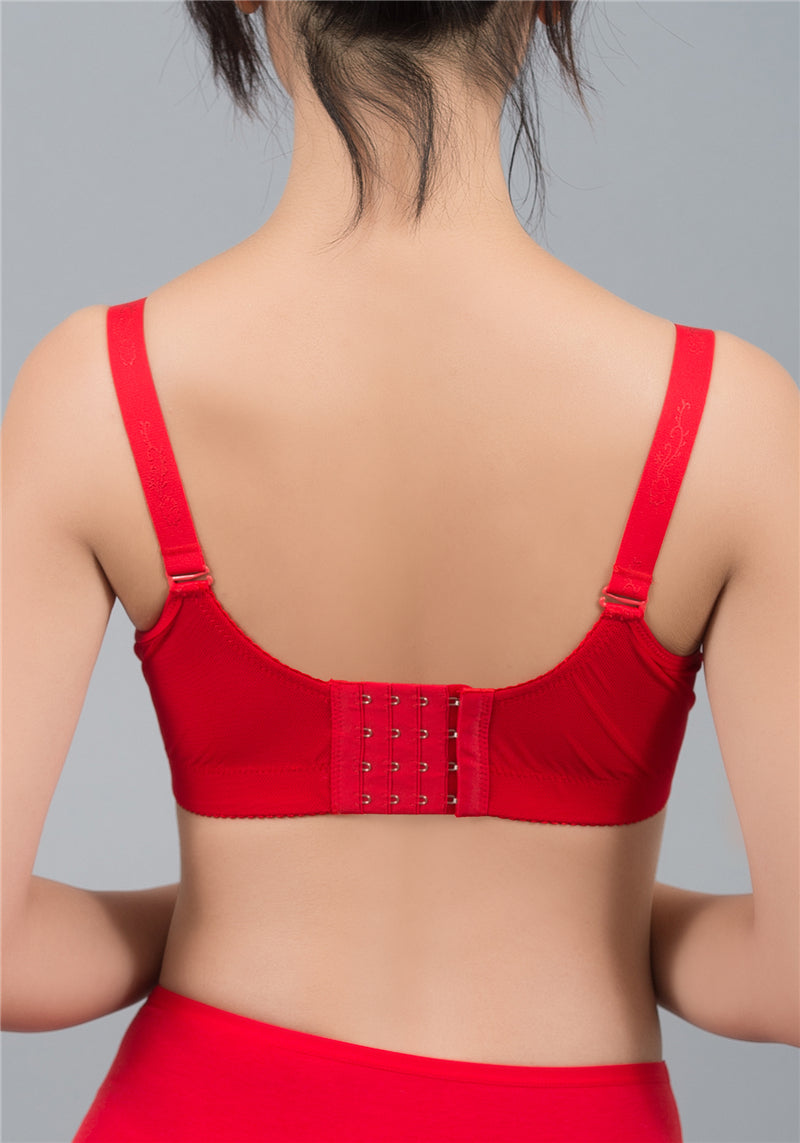 Front view of red wireless lace push-up contour bra with bold embroidery and padded cups