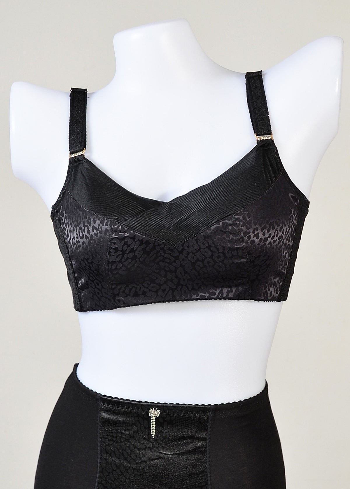 Front view of black leopard print underwire push-up contour bra with convertible straps