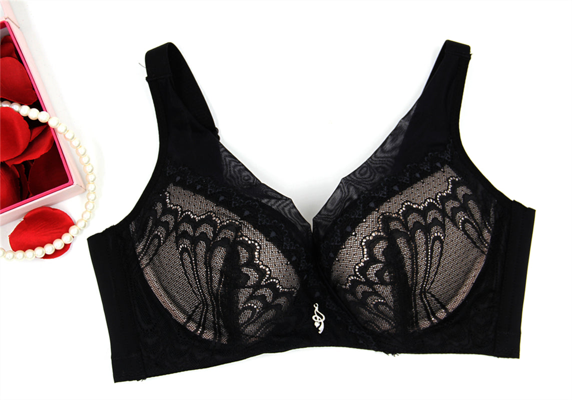 Detail view of lace embroidery on black wireless padded push-up contour bra