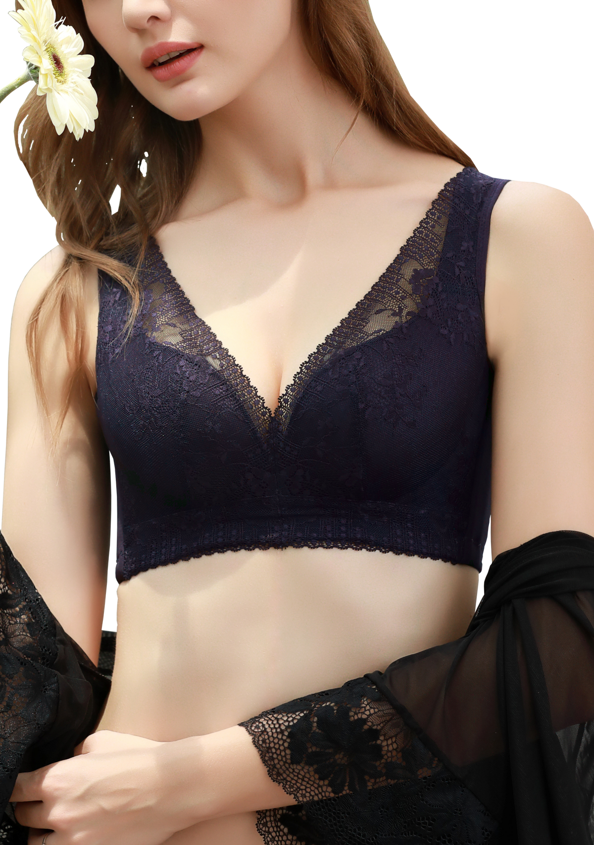 Angled view of red wireless silk contour bra highlighting embroidered lace detail